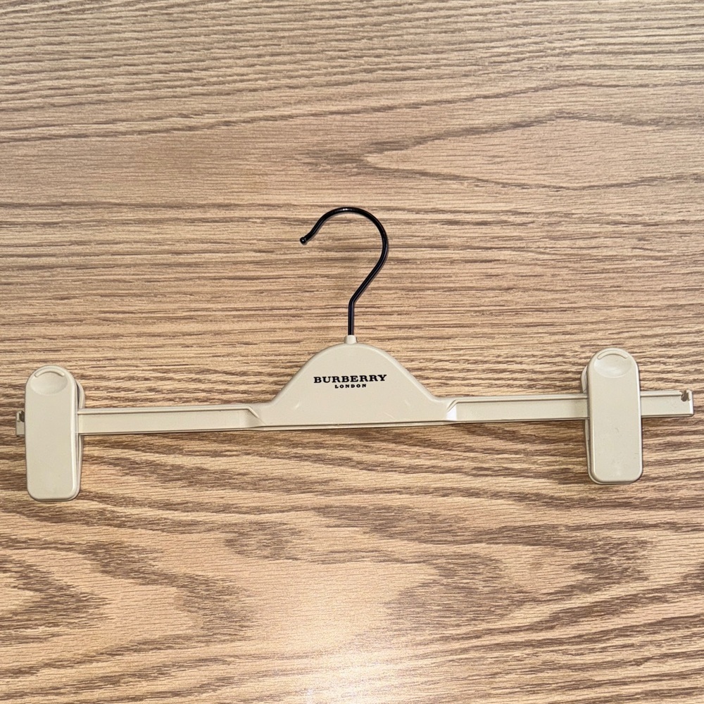 Burberry Hard Plastic Cream Tan Hanger with Black Letters Adjustable Clips